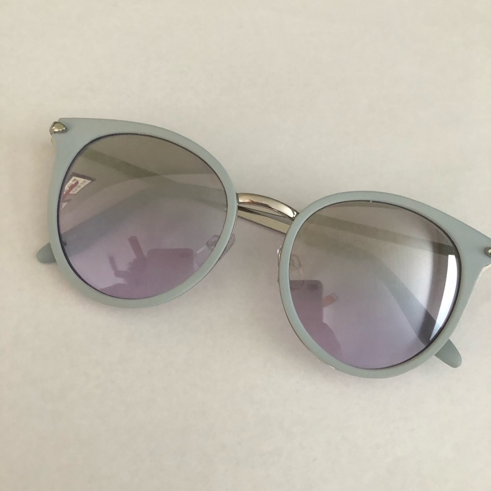 Super cute light blue frames with purple tint lens